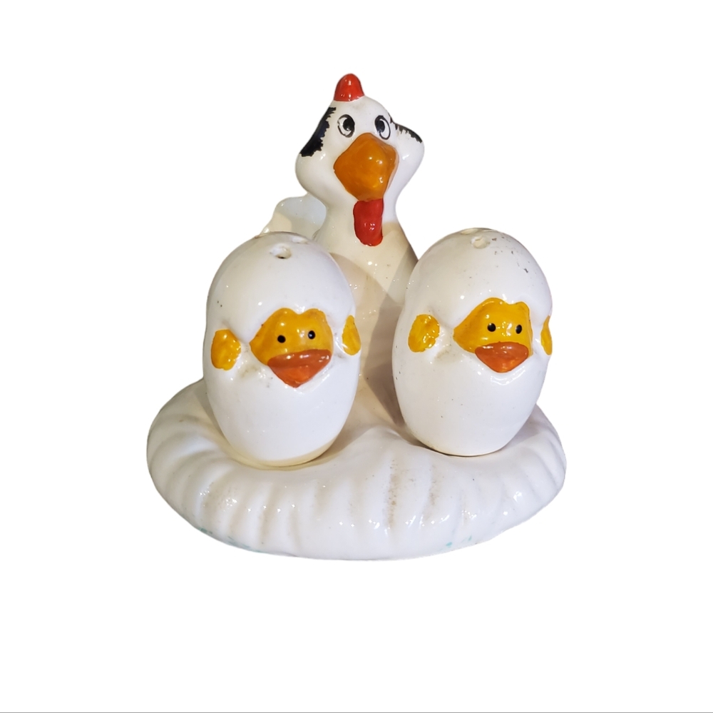 Vintage mother hen with chick egg salt and pepper shakers